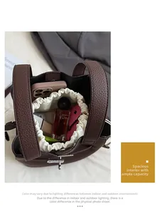 Top view of brown lychee grain leather bucket bag showing large interior capacity