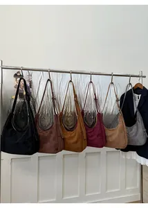 Multiple hobo shoulder bags in suede finish featuring six various stylish colors