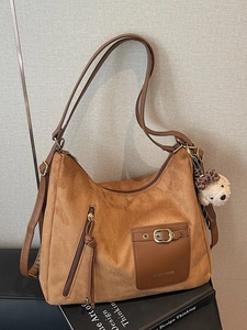 Brown large capacity suede tote bag with puppy charm and front pockets for daily commute