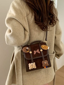Retro brown contrast color backpack with cute plush cartoon patches for women