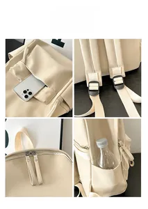 Detail view of the beige PU leather backpack showing side pockets for water bottles and phones