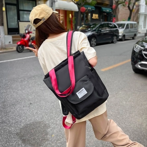 Sac à dos nylon noir et rose à grande capacité pour ordinateur portable porté en extérieur
