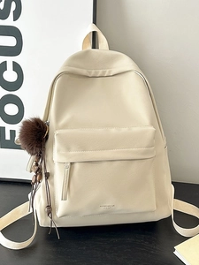 Minimalist cream faux leather backpack with pompom charm for school and daily commute