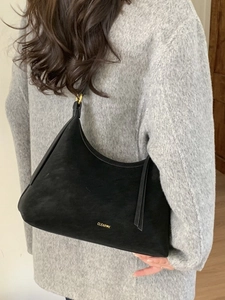 Retro black suede large capacity dumpling shoulder bag with gold Clear K branding for women
