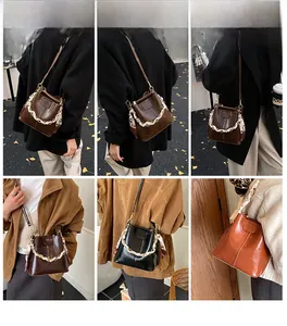 Detail shots of bucket bags in vintage colors with silk scarf handles and leather texture