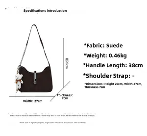 Detailed dimensions of a dark brown suede underarm bag with silver chain and bear charm