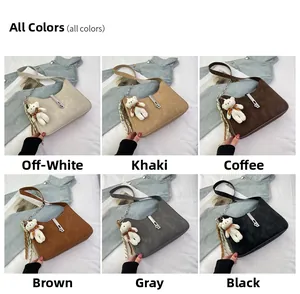 Showcase of minimalist suede underarm bags in six colors with a cute bear charm