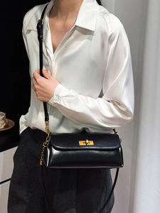 Chic black oil wax leather shoulder bag with gold rectangular clasp for women