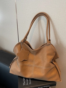 Retro camel tote bag with white contrast stitching and star charm for women