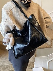 Large capacity black soft leather tote bag with a plush rabbit charm for women