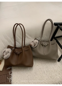 Retro minimalist tote bags in dark brown and taupe with cute plush bunny pendants