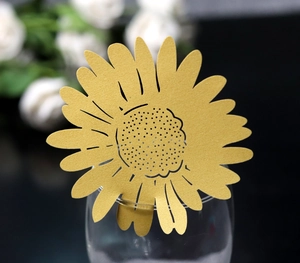 Sunflower glass place card in bright yellow with laser-cut hollow details for weddings