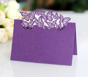 Elegant purple hollow laser-cut butterfly place card for wedding table settings