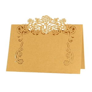 Golden pearl paper table place cards with laser cut hollow rose floral design for events