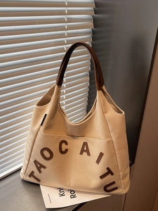 Retro canvas tote bag with brown leather handles and embroidered letters for women