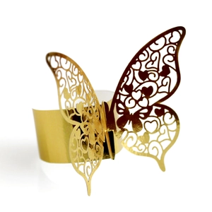 Golden hollow butterfly napkin ring with laser-cut heart patterns for wedding decor