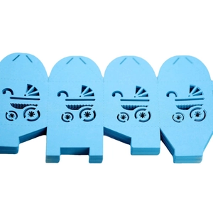 Flat laser-cut baby carriage gift box in light blue for party candy packaging