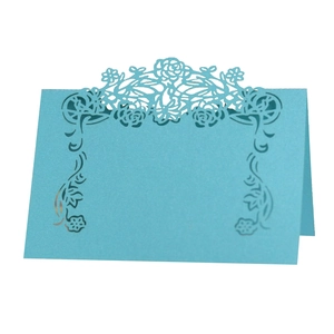 Teal laser-cut rose floral place cards made of premium pearlescent paper for table decor