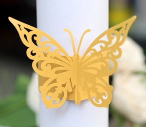 Elegant gold butterfly napkin ring with laser cut hollow patterns for wedding decor