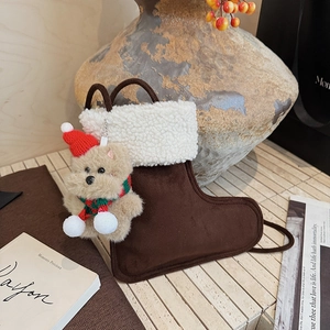 Christmas plush boot bag with brown teddy bear and white faux fur trim for winter decor
