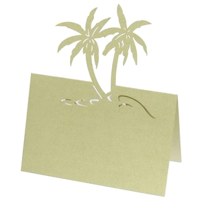 Close-up of laser-cut coconut tree place card in pale green for beach weddings