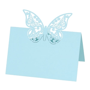 Detailed laser-cut butterfly place card in light blue for wedding table seating