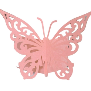 Pink laser-cut butterfly napkin ring made of pearlescent paper for wedding table decor