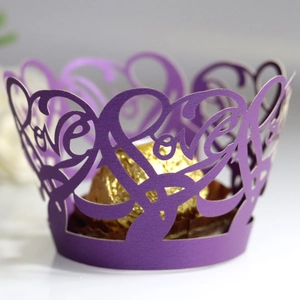 Purple laser-cut hollow love heart cupcake wrapper with golden foil chocolate decoration