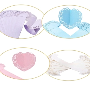 Laser-cut hollow heart napkin rings in pink, blue, ivory and purple pastel colors