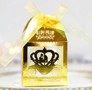 Golden laser-cut hollow gift box with crown and pumpkin carriage design for wedding favors