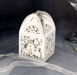 Detailed laser-cut heart and couple pattern on white pearl paper wedding favor box