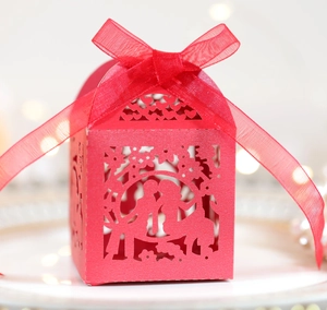 Laser-cut red candy box for Valentine's and weddings with ribbons and floral patterns