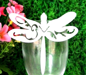 Elegant white dragonfly laser-cut paper wine glass card for wedding and party decorations