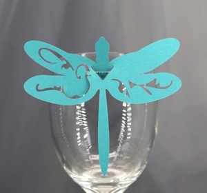 Laser-cut cyan dragonfly paper place card for wedding glass and table decoration