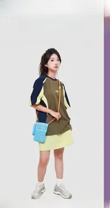 Outdoor leisure look featuring a sky blue mesh crossbody bag and colorful sport outfit