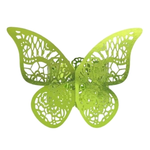Detail of laser-cut butterfly napkin ring in grass green featuring intricate hollow patterns
