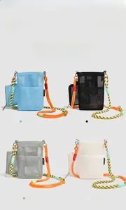 Detailed grid view of mesh crossbody phone bags in blue, black, grey, and white options