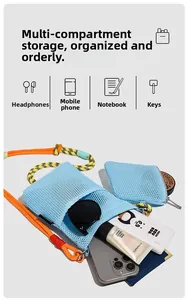 Flat lay of light blue mesh crossbody bag with orange rope strap showing spacious storage