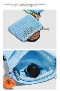 Detail view of light blue mesh crossbody bag featuring orange rope and interior compartments