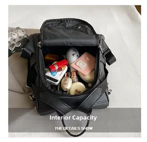 Top view detail of black nylon backpack internal main compartment with large storage capacity