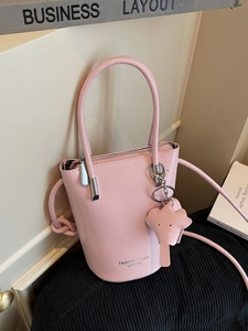 Chic pink PU leather bucket bag with top handle and elephant charm decoration