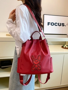 Red fashion backpack with sequined bear patch and adjustable straps for women
