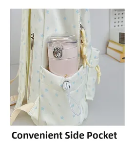 Detail of canvas backpack side pocket with elastic drawstring and pink water bottle
