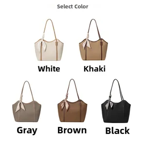 Selection of large tote bags in five colors with decorative silk scarves on handles