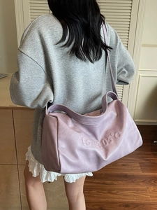 Minimalist light purple large capacity leather tote bag with embossed lettering detail