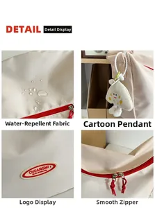 Detail view of beige nylon crossbody bag featuring waterproof fabric and red zippers