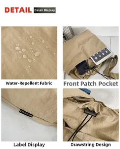 Detail view of khaki nylon bucket bag showing drawstring closure and waterproof fabric