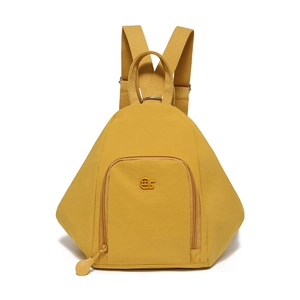 Close-up of bright yellow nylon backpack featuring a front zipper pocket and logo