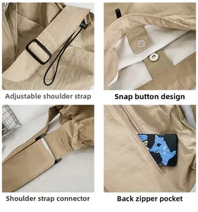 Detail view of khaki nylon bucket bag showing adjustable strap, magnetic snap and zipper pocket