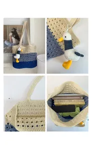 Detail view of tri-color knit tote bag with seagull charm and large interior capacity